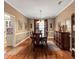Formal dining area with hardwood floors, and traditional furnishings at 155 Matthew Way, Fayetteville, GA 30214