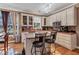 White cabinets, granite countertops and stainless appliances are kitchen highlights at 155 Matthew Way, Fayetteville, GA 30214
