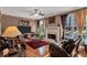 Inviting living room with hardwood floors, fireplace, and natural light at 155 Matthew Way, Fayetteville, GA 30214