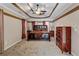 Primary bedroom featuring a tray ceiling, carpet, and neutral wall color at 155 Matthew Way, Fayetteville, GA 30214