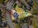 A beautiful aerial view of the home showing the pool, large lot, and surrounding neighborhood at 166 Erie Ave, Decatur, GA 30030