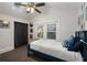 Bedroom with a vaulted ceiling, skylight, white walls, and a large closet with black curtains at 166 Erie Ave, Decatur, GA 30030