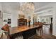 Spacious dining room featuring unique chandelier and seating for four at 166 Erie Ave, Decatur, GA 30030