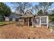 Charming playhouse in a tree-lined backyard with unique brick trim at 166 Erie Ave, Decatur, GA 30030