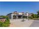 Exterior shot of the community building with playground and clear sky for outdoor activities and gatherings at 825 Highland Ne Ln # 1206, Atlanta, GA 30306