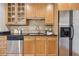 Kitchen with stainless appliances, granite counters, and cabinets at 825 Highland Ne Ln # 1206, Atlanta, GA 30306