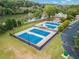 An overhead view showcases tennis courts with parking at 9570 Huntcliff Trce, Atlanta, GA 30350