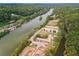 View of equestrian center and river with lush trees at 9570 Huntcliff Trce, Atlanta, GA 30350