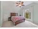 Bedroom with large windows and plenty of natural light at 9570 Huntcliff Trce, Atlanta, GA 30350