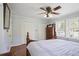 Bright bedroom with hardwood floors, neutral walls, and ample closet space at 2484 Oldfield Nw Rd, Atlanta, GA 30327