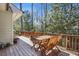 Exterior shot of a deck featuring a small outdoor dining set perfect for enjoying meals outdoors at 2484 Oldfield Nw Rd, Atlanta, GA 30327