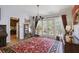 Open dining area with hardwood floors, French doors to the outside and access to kitchen at 2484 Oldfield Nw Rd, Atlanta, GA 30327