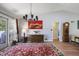 Bright dining room with hardwood floors, stylish chandelier, and doors leading to the deck at 2484 Oldfield Nw Rd, Atlanta, GA 30327
