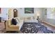 Comfortable living room with a large sectional, decorative rug, and abundant natural light at 2484 Oldfield Nw Rd, Atlanta, GA 30327