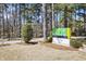 Atlanta Memorial Park signage along walking trail with green space surrounded by lush trees at 2484 Oldfield Nw Rd, Atlanta, GA 30327