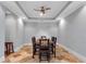 Formal dining room perfect for entertaining with designer ceiling and travertine tile floor at 3195 Wills Mill Rd, Cumming, GA 30041