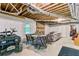 Finished basement with gas fireplace, table, and seating area at 684 Old Cumming Rd, Sugar Hill, GA 30518