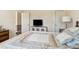 Bedroom features modern decor, two closets and a large window at 684 Old Cumming Rd, Sugar Hill, GA 30518