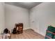 Simple, yet stylish, this bedroom offers a clean space with wood-look flooring and bright white walls at 684 Old Cumming Rd, Sugar Hill, GA 30518