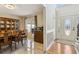 Formal dining room with large windows and a view of the porch swing at 684 Old Cumming Rd, Sugar Hill, GA 30518