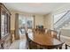 Formal dining room featuring a staircase and view of the backyard at 684 Old Cumming Rd, Sugar Hill, GA 30518