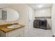 Laundry room with appliances, wood counters, and sink at 684 Old Cumming Rd, Sugar Hill, GA 30518