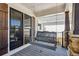 Relaxing porch with a hanging swing, perfect for enjoying the outdoors at 684 Old Cumming Rd, Sugar Hill, GA 30518