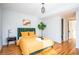 Bright bedroom featuring wood floors and stylish decor at 2411 Fair Ln, Decatur, GA 30032