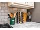 Detailed view of a kitchen counter with marble backsplash and countertop accessories at 2411 Fair Ln, Decatur, GA 30032