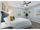 Cozy bedroom featuring natural light, a ceiling fan, and carpeted floors at 3261 Lowndes St, Atlanta, GA 30337