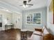 Cozy living room featuring hardwood floors, fresh paint, and lots of natural light at 3261 Lowndes St, Atlanta, GA 30337