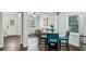 An open-concept living room showcases hardwood floors and views of the dining room and entrance at 3261 Lowndes St, Atlanta, GA 30337