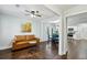 Inviting living room featuring hardwood floors, fresh paint, and lots of natural light at 3261 Lowndes St, Atlanta, GA 30337