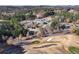 Expansive aerial view of a golf course and neighborhood with luxury homes and mature trees at 39 Telfair Ct, Acworth, GA 30101