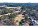 Scenic aerial shot showcasing the property and its surrounding golf course and landscape at 39 Telfair Ct, Acworth, GA 30101