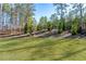 Picture of a well-maintained backyard, enhanced by mature trees for added privacy at 39 Telfair Ct, Acworth, GA 30101