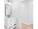 Elegant bathroom with a white vanity, marble countertop, and black accents, showcasing modern fixtures at 39 Telfair Ct, Acworth, GA 30101