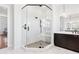 Modern bathroom featuring a glass-enclosed shower with a seat, with double sink vanity at 39 Telfair Ct, Acworth, GA 30101