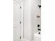 Bathroom featuring a shower and tub combo with white tile, black fixtures, and a shower niche at 39 Telfair Ct, Acworth, GA 30101