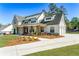 Lovely two-story home with a three-car garage, long driveway, and landscaped front yard at 39 Telfair Ct, Acworth, GA 30101