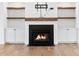 Close up of the fireplace with built in shelving on either side and a dark stone hearth at 39 Telfair Ct, Acworth, GA 30101