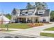 Charming home with a well-maintained lawn, elegant landscaping, and a long driveway at 39 Telfair Ct, Acworth, GA 30101