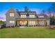 Stunning brick and siding home with a welcoming front porch and manicured lawn at 39 Telfair Ct, Acworth, GA 30101