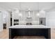 Spacious kitchen with a large island that has seating and stainless steel appliances and fixtures at 39 Telfair Ct, Acworth, GA 30101