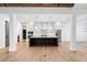 Spacious kitchen featuring a large kitchen island with white countertops and white cabinets at 39 Telfair Ct, Acworth, GA 30101
