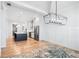 Bright open-concept living room featuring a rug and views into a modern kitchen at 39 Telfair Ct, Acworth, GA 30101