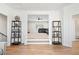 Open living room with steps leading to a cozy basement and a view of the entertainment room at 39 Telfair Ct, Acworth, GA 30101