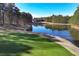 Picturesque golf course with a beautiful pond surrounded by lush greenery and trees at 39 Telfair Ct, Acworth, GA 30101