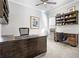 Spacious home office with built-in shelving and executive desks at 10570 Grandview Sq, Johns Creek, GA 30097