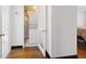 Convenient in-unit laundry area with stacked washer and dryer neatly tucked away behind a white louvered door at 1501 Clairmont Rd # 1027, Decatur, GA 30033